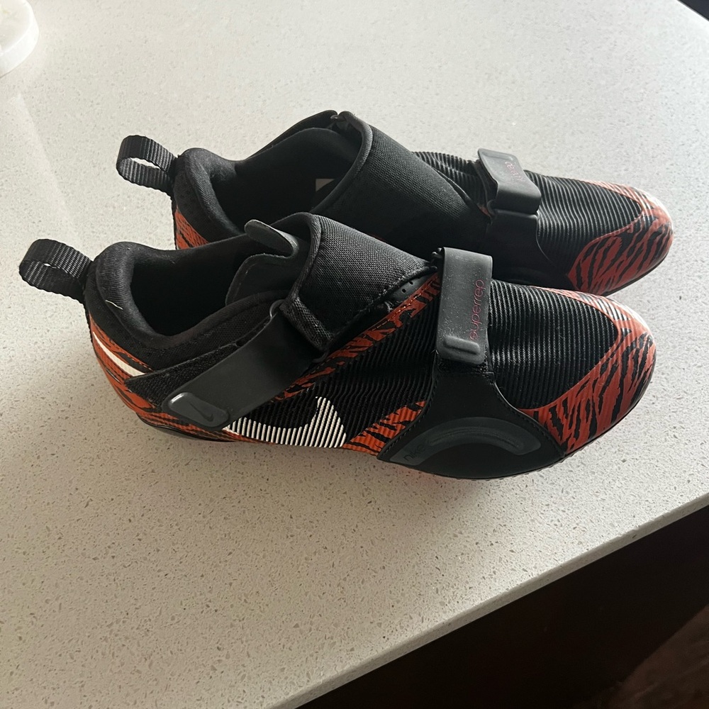 Nike Women’s Cycling shoes (used 5 times) 
Size 9
Peleton compatible